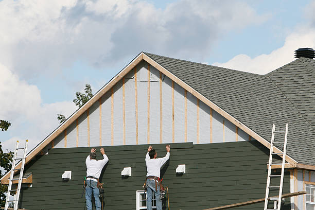 Professional Siding technician working in Haltom City, TX